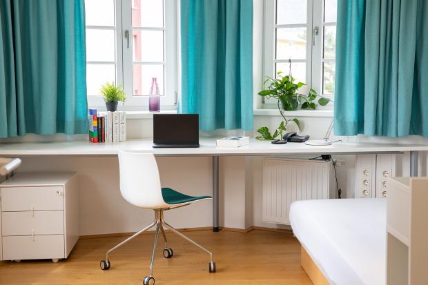 view of residence room with desk 